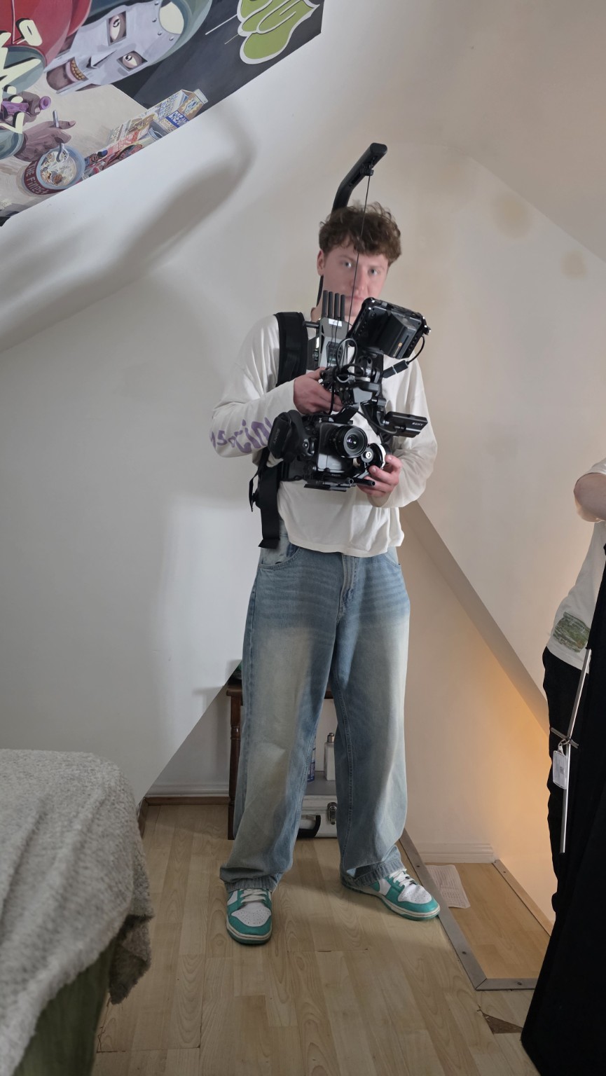 Henry Sedgley operating a cinema camera