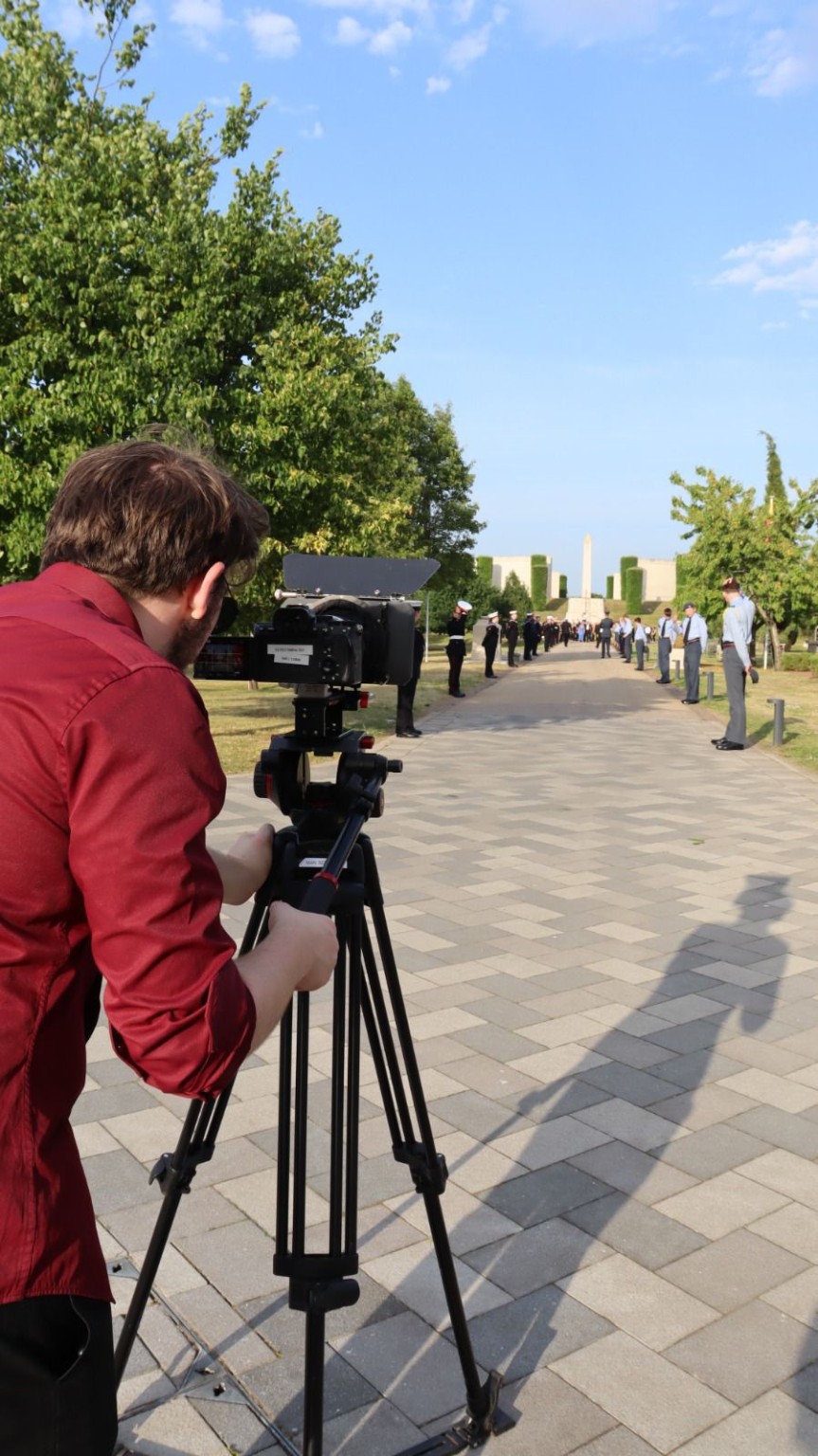 Camera operator filming the event