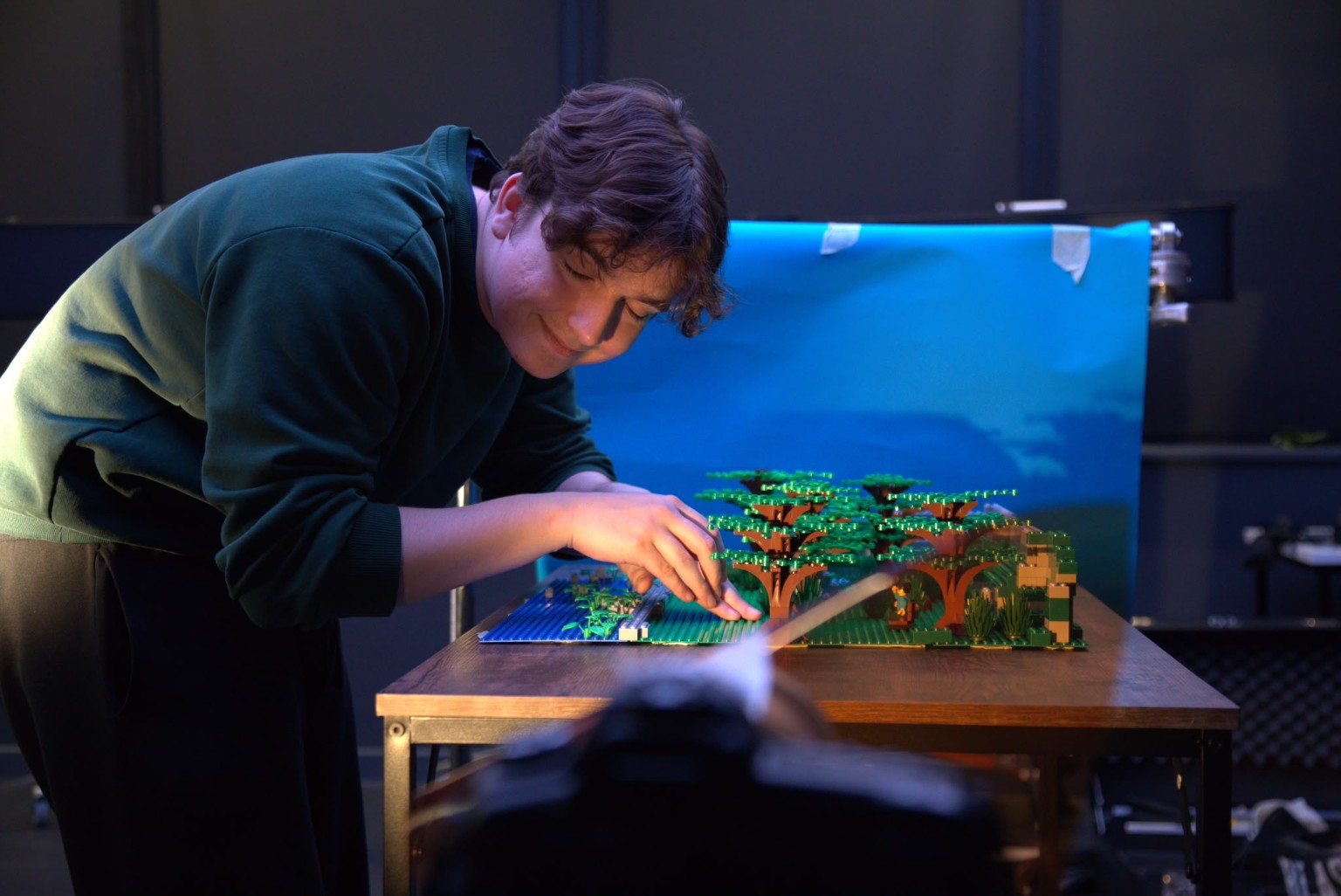 Ryan Flanagan working on a stop-motion animation set