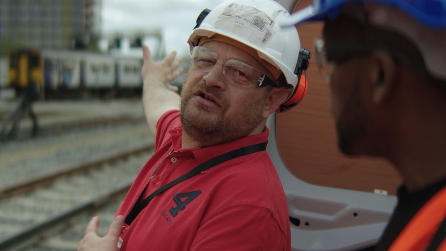Railway engineering trainer wearing a hard hat