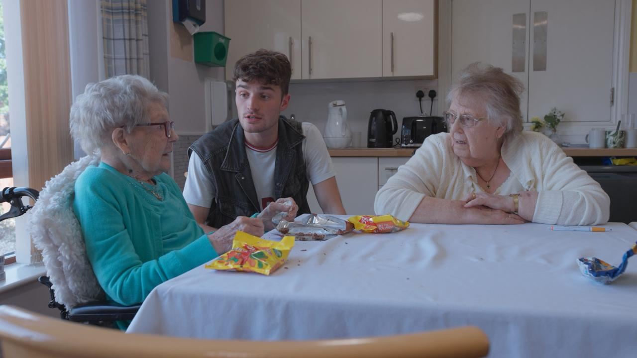 Residents and crew during production