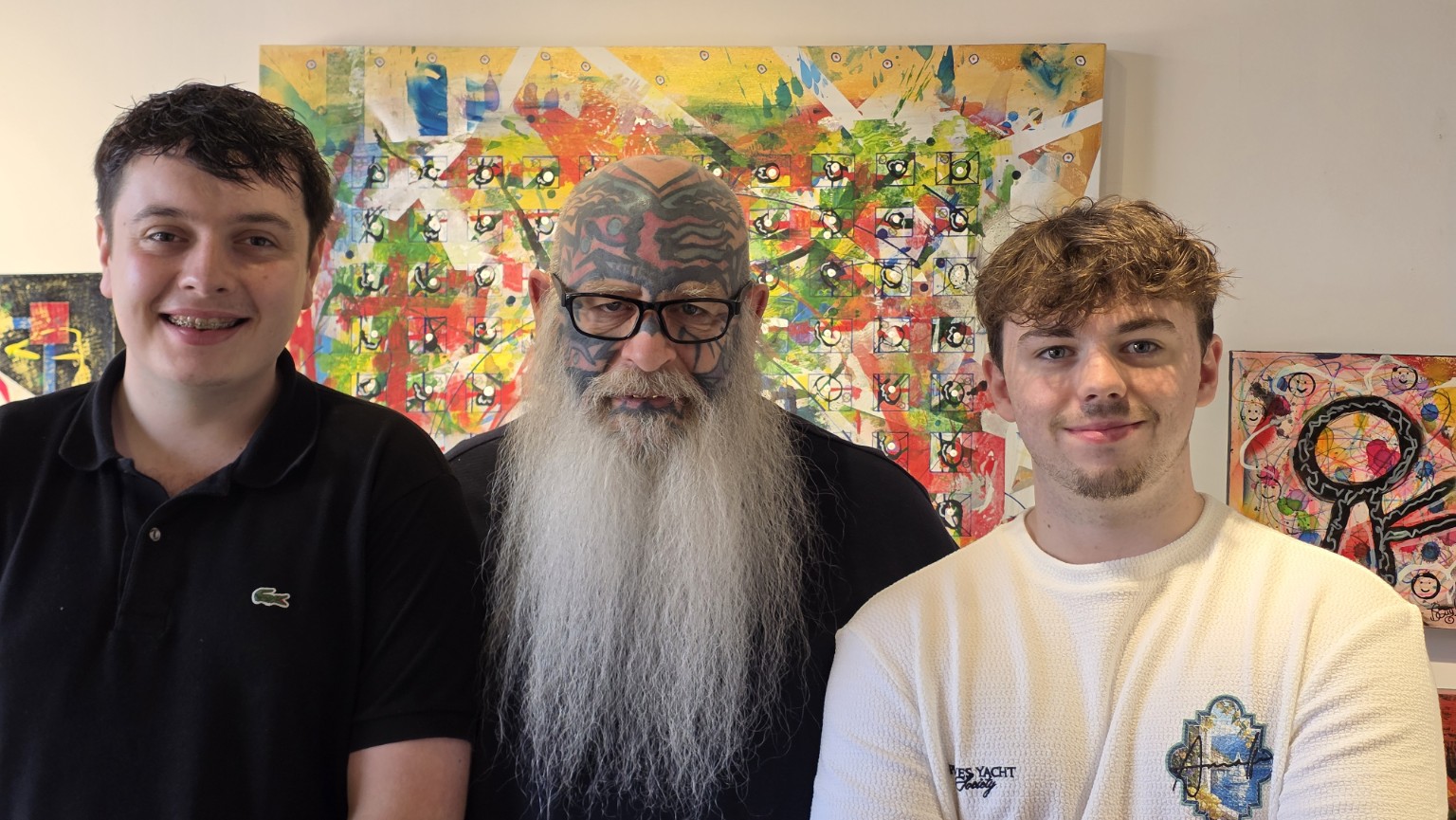 The Scary Guy with members of the Red Boots team