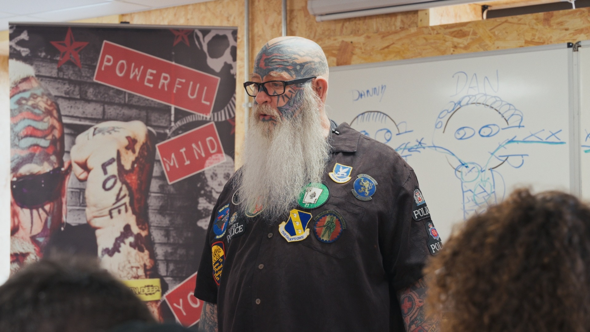 The Scary Guy speaking to a group