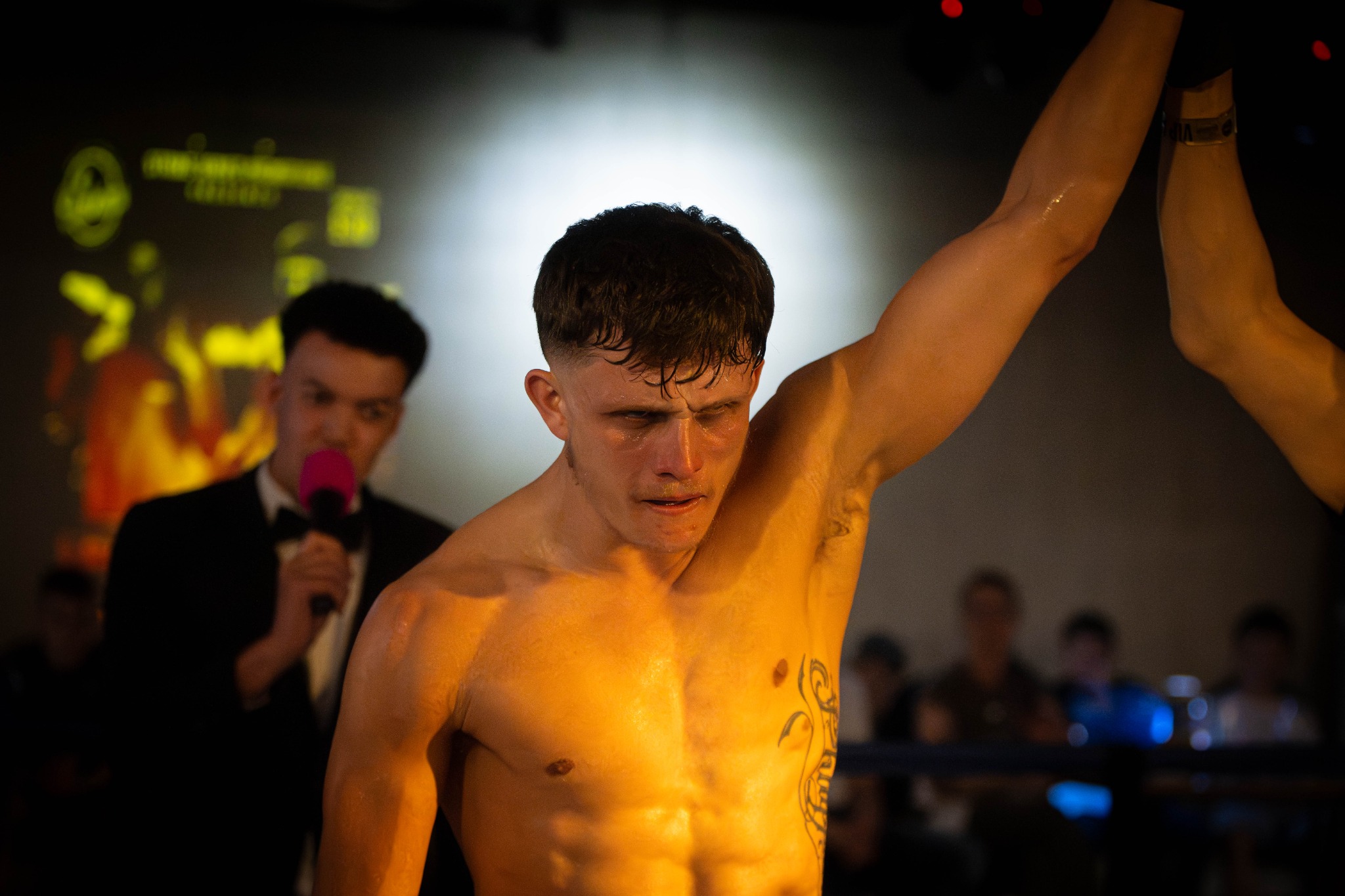 Winning fighter having his hand raised