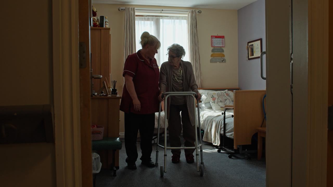 Resident supported by care staff during The ACB Project